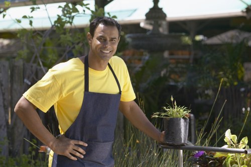 Romford garden landscaping featuring planting beds and patio work